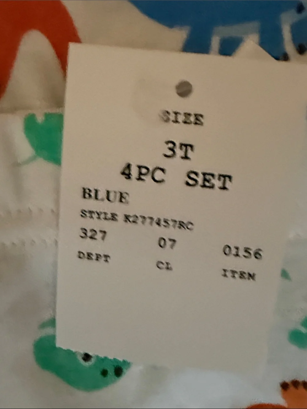 Ms Rachel Kids White Pajama Set with Blue, Orange, Green, and Purple Dinosaurs